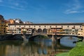 FLORENCE, ITALY Ã¢â¬â ÃÅÃÂY 25, 2017: River Arno and famous bridge Ponte Vecchio The Old Bridge at sunny summer day. Royalty Free Stock Photo